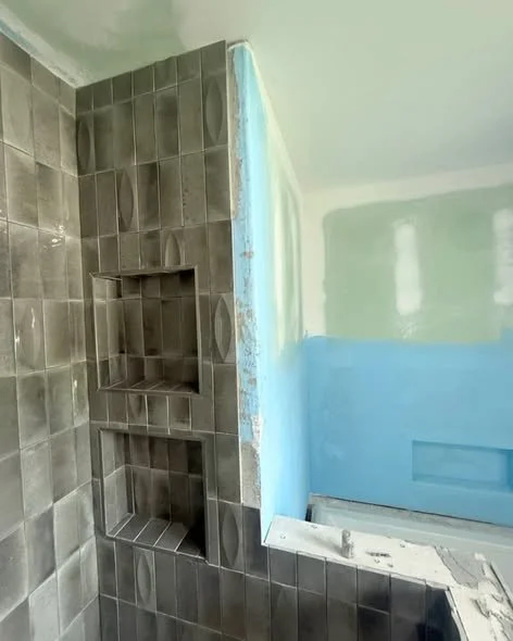 Hardwood flooring installation and custom dog shower tile prep by Mims Construction in Riverview Chattanooga TN