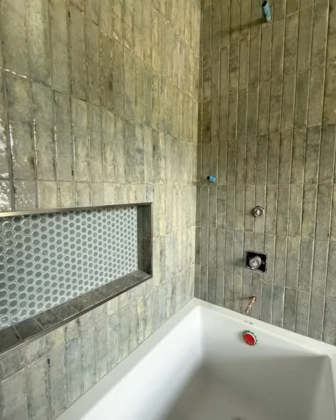 Hardwood flooring installation and custom dog shower tile prep by Mims Construction in Riverview Chattanooga TN