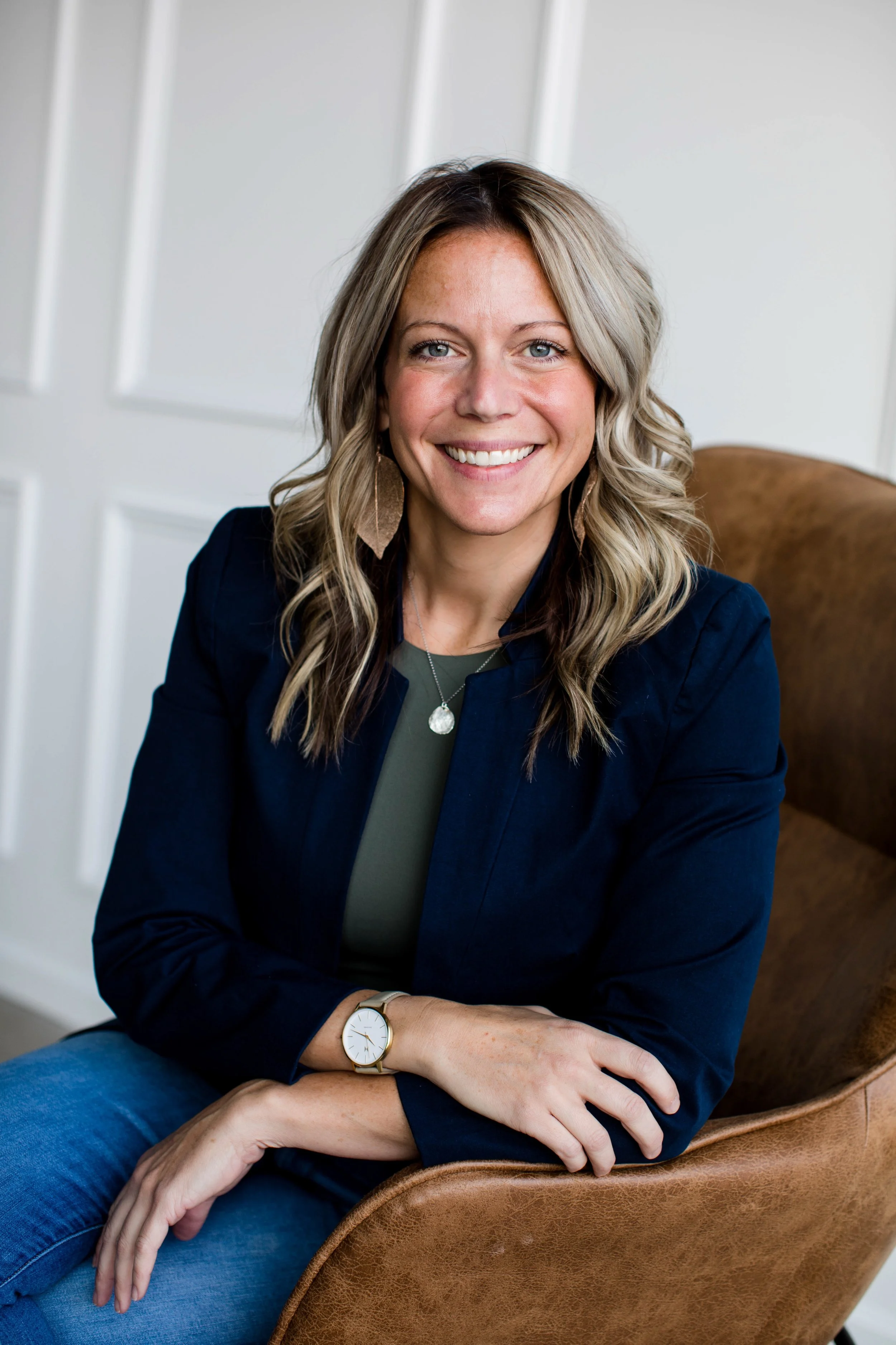 Portrait of Dr. Danielle Fitch, board certified psychiatric mental health nurse practitioner and holistic mental health specialist at Fejeran Wellness Society in Des Moines, IA