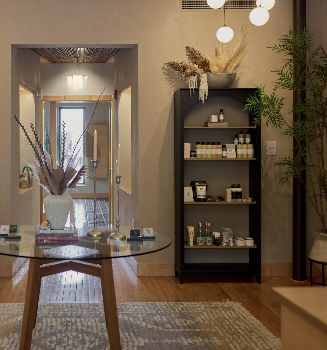 Curated retail area at Fejeran Wellness Society featuring wellness products from practitioners in Des Moines, Iow