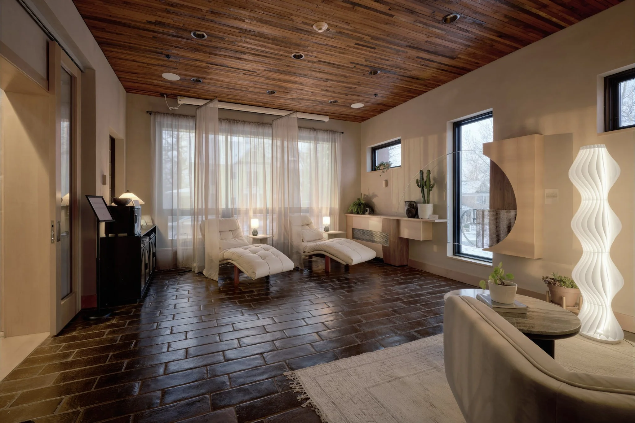 Warm, relaxing interior of Fejeran Wellness Society's shared wellness space in Des Moines, IA