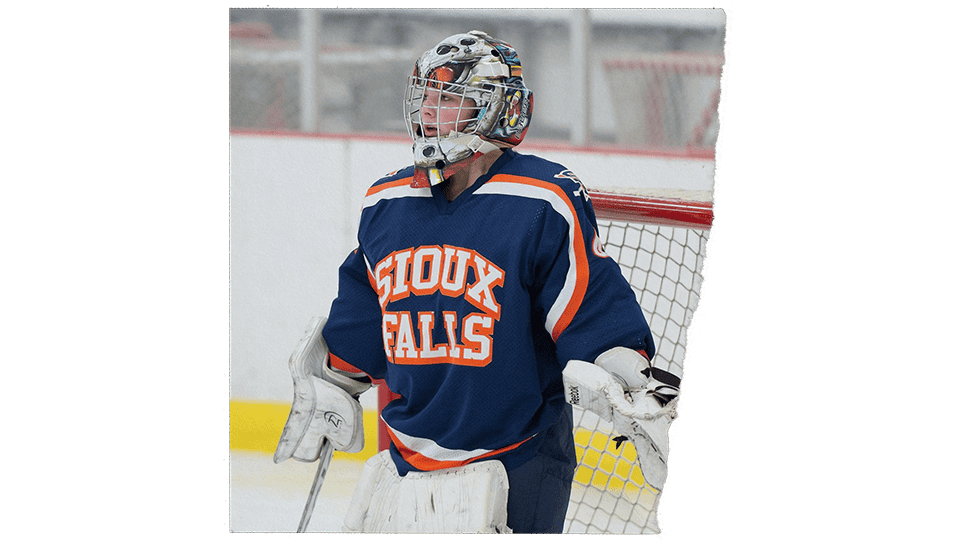 Brittany Drake playing hockey