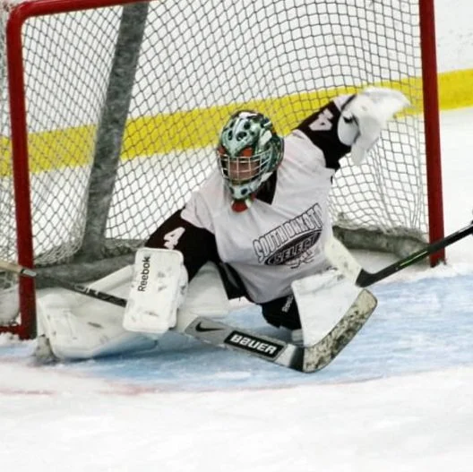 Brittany Drake playing hockey