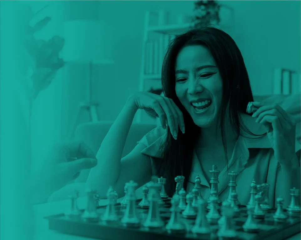 A woman playing chess