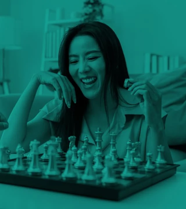 A girl playing chess