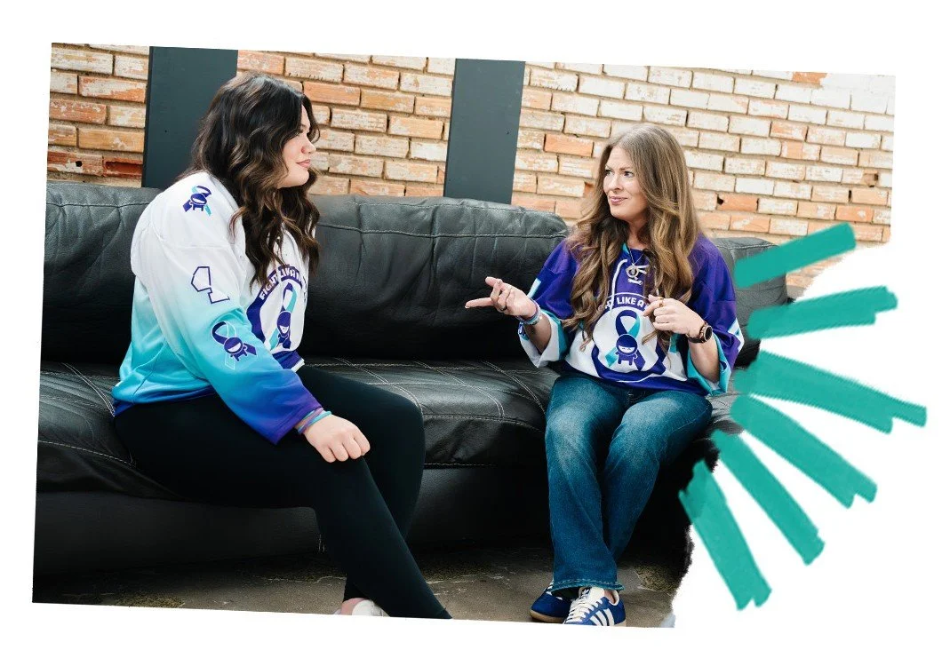 Angela Drake with another woman both wearing Fight Like a Ninja merch