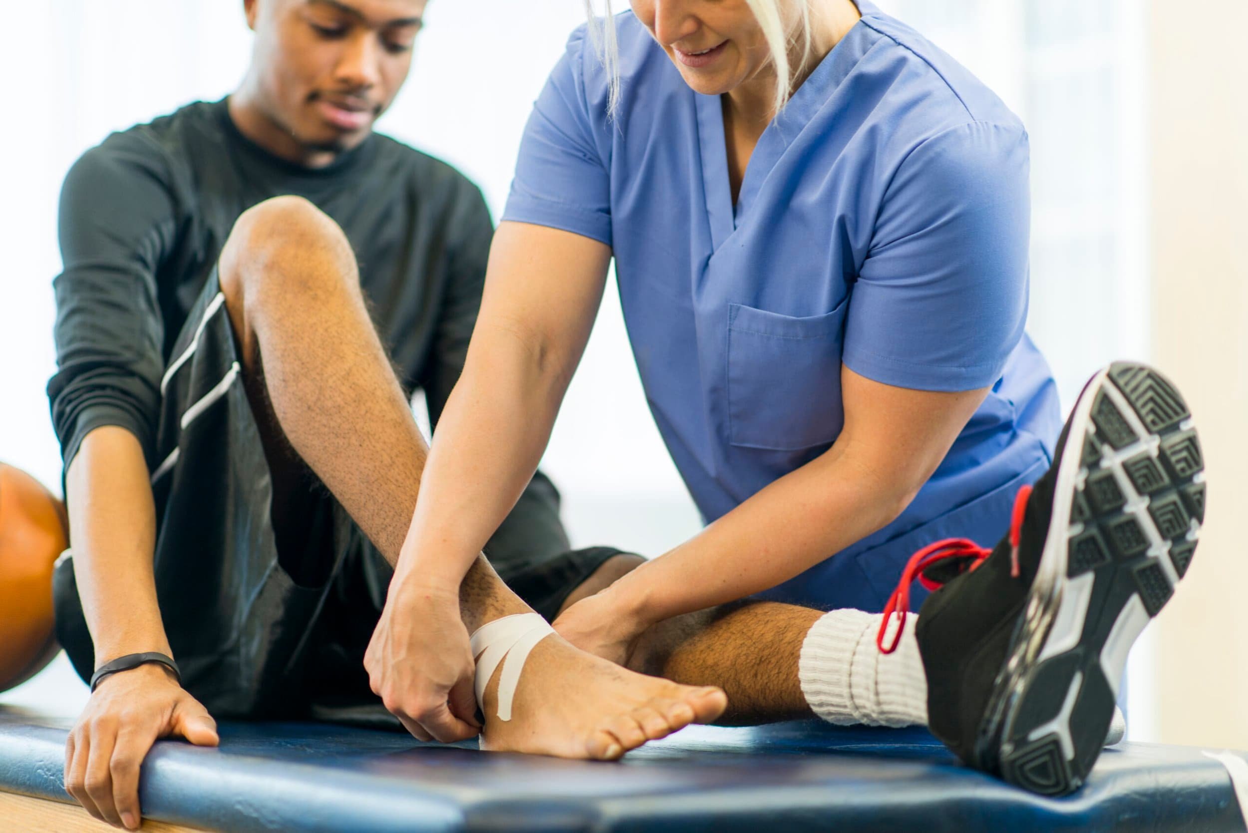 Ankle injury treated with ankle taping