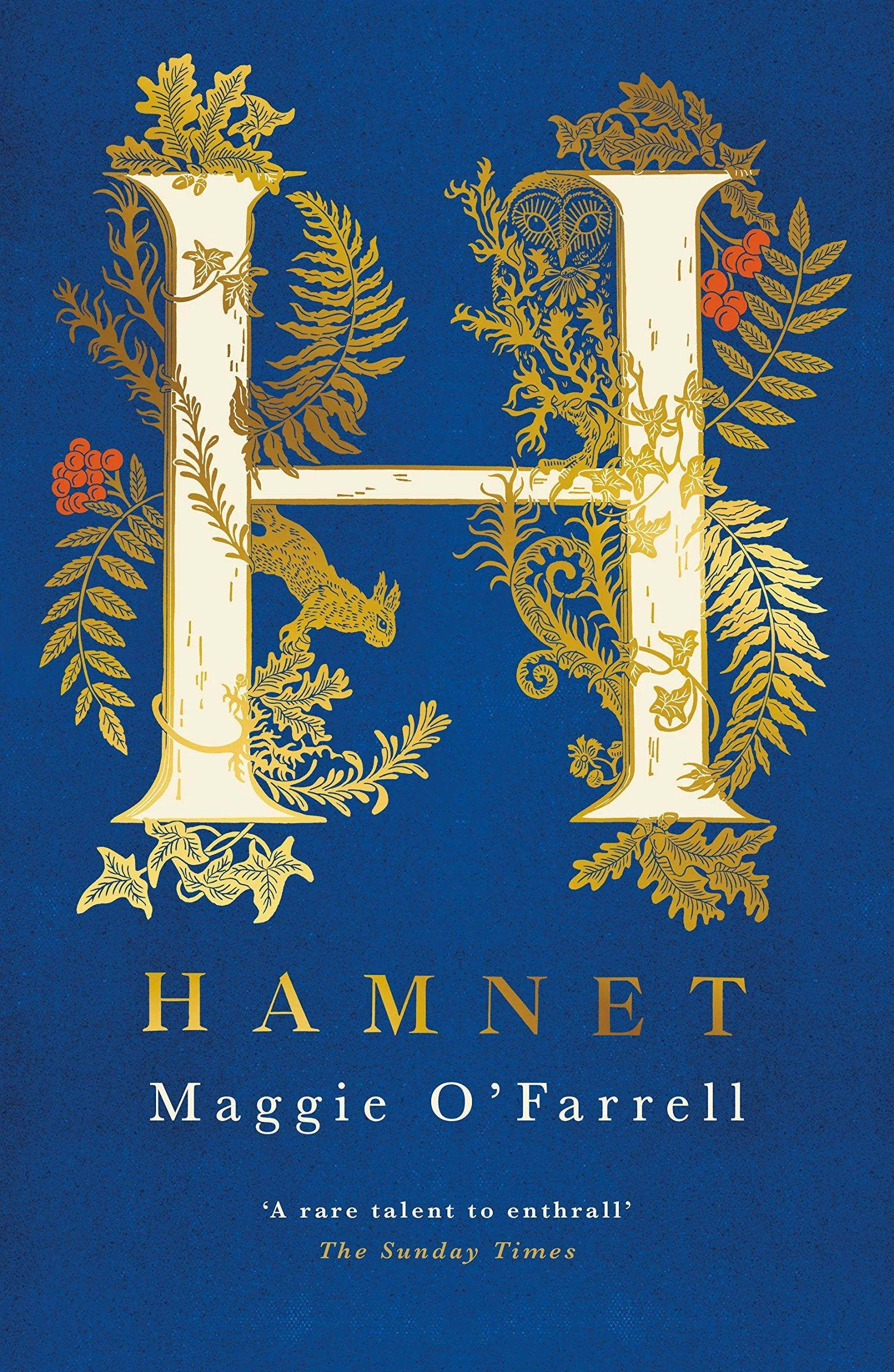 Cover of the book 'Hamnet' by Maggie O'Farrell, featuring a large letter 'H' decorated with gold botanical illustrations on a dark blue background.