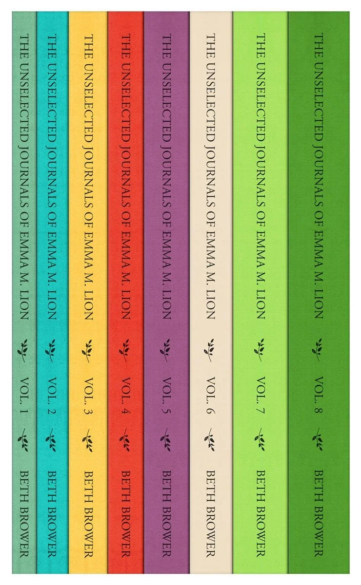 A collection of eight colorful book spines with titles of journals by Emma M. Lion, arranged in a gradient from light teal to dark green. Each spine displays the journal's name, volume, and the author's name, with small decorative leaves at the bottom.