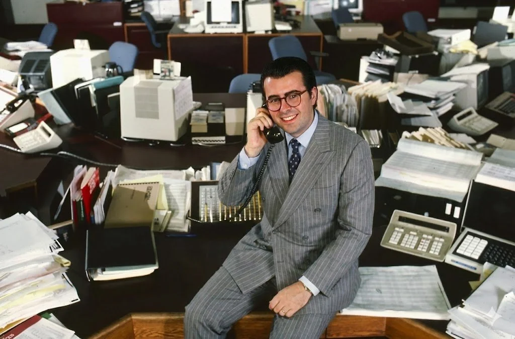 Jerry Baker Founder of Baker 1031 Investments Sitting on Desk