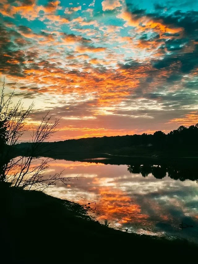 A beautiful sunset captured over the 37 acre spring fed lake