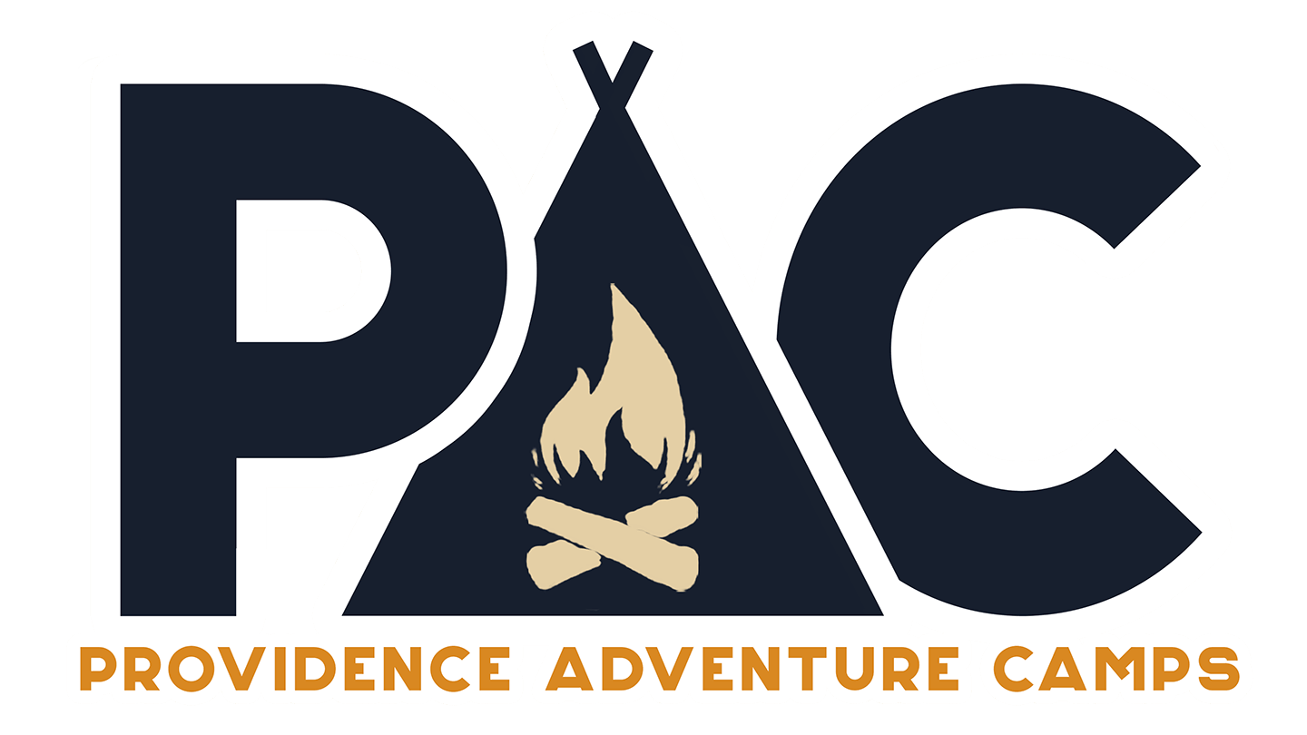 Custom logo for Providence Adventure Camps — bold navy 'PAC' letters with a campfire inside a tent shape and orange 'Providence Adventure Camps' text below. Clean, adventurous design by Heather at Genuine Midwest Consulting."