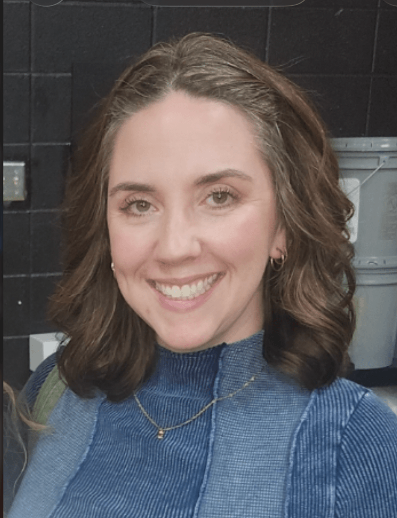 Youth group leader head shot, happy logo client of Genuine Midwest Consulting, design by Heather.