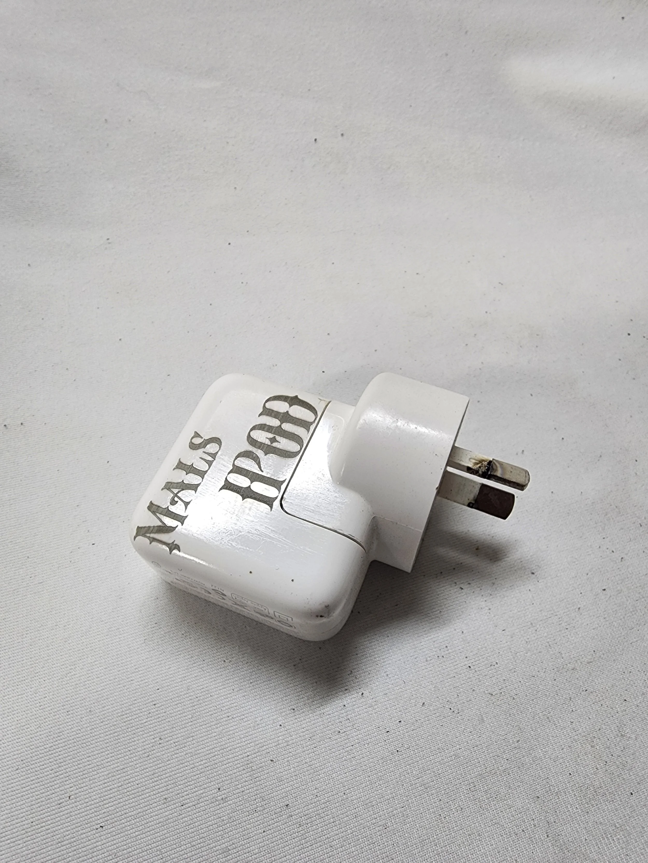 plastic engraved ipod plug.jpg