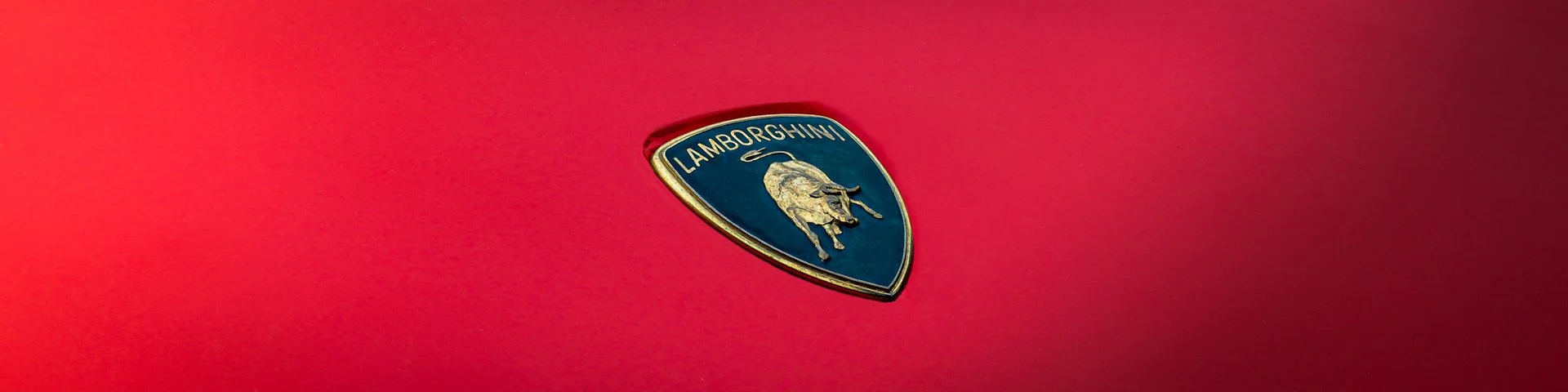 lamborghini-logo-emblem-red-exotic-car.jpg
