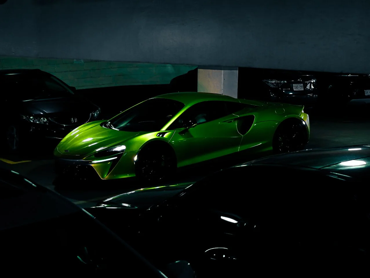 green-mclaren-artura-underground-parking-yorkville-toronto.jpg