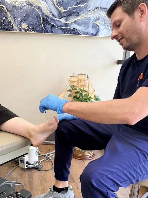 Dr. Zak Oddone performing a diabetic foot examination at Salt Lake City Podiatry