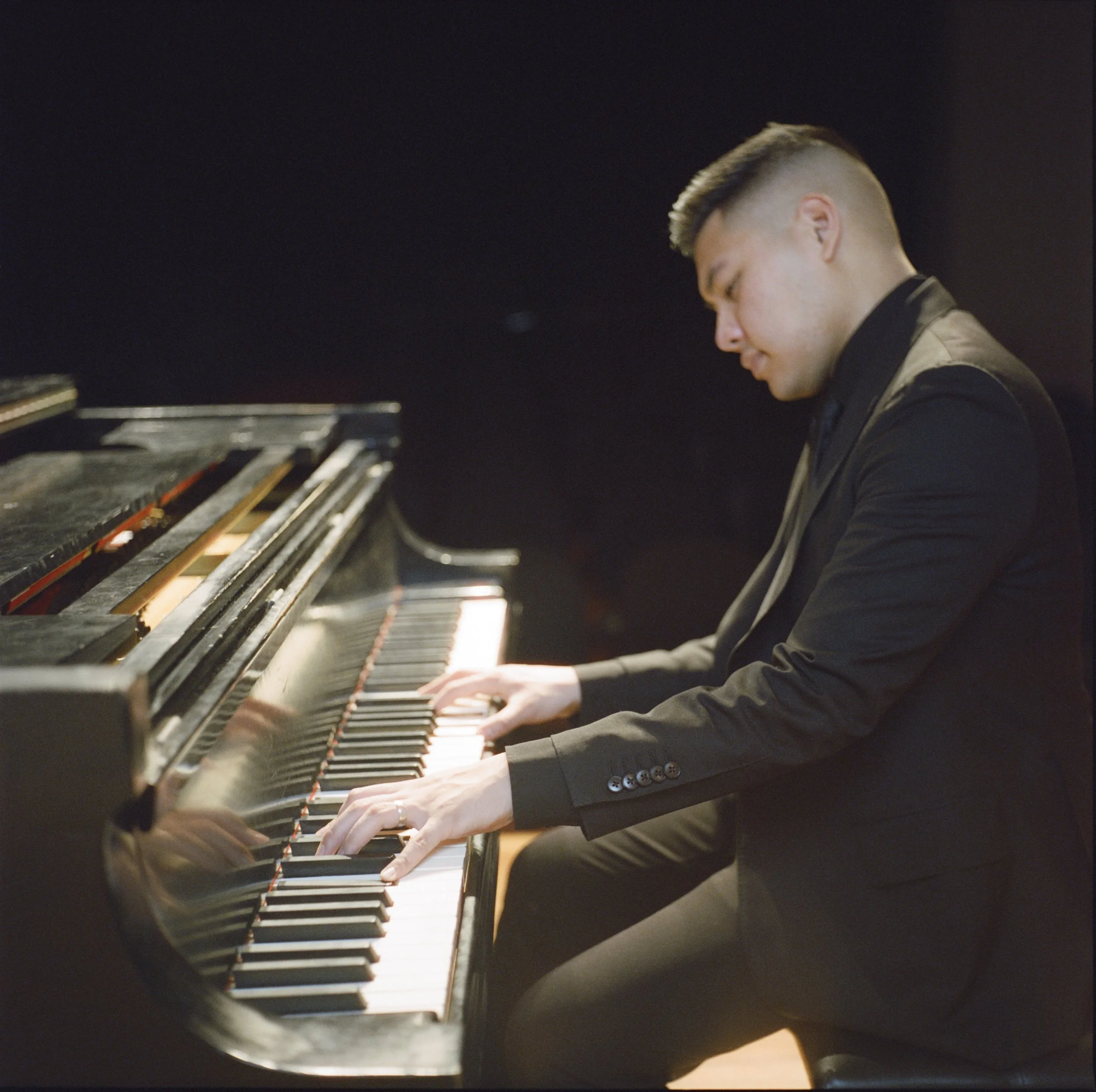 Isaac performing at a private event in NYC