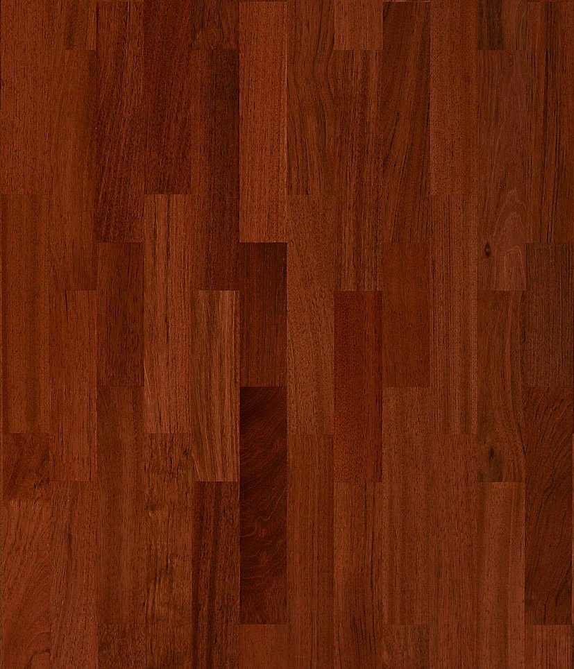 Close-up of a wooden floor with reddish-brown planks.