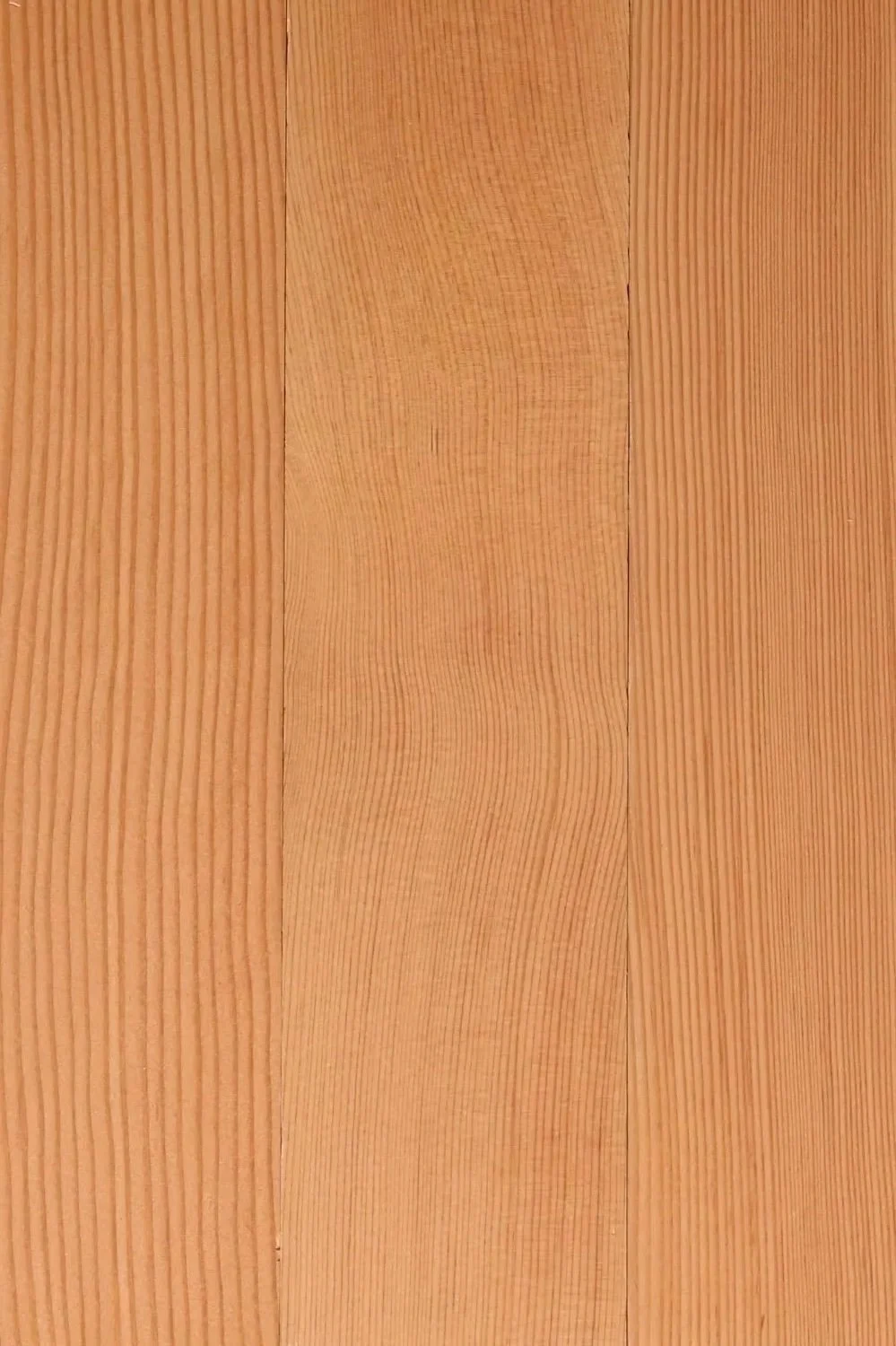 Close-up of wooden planks with visible grain patterns and natural finish.