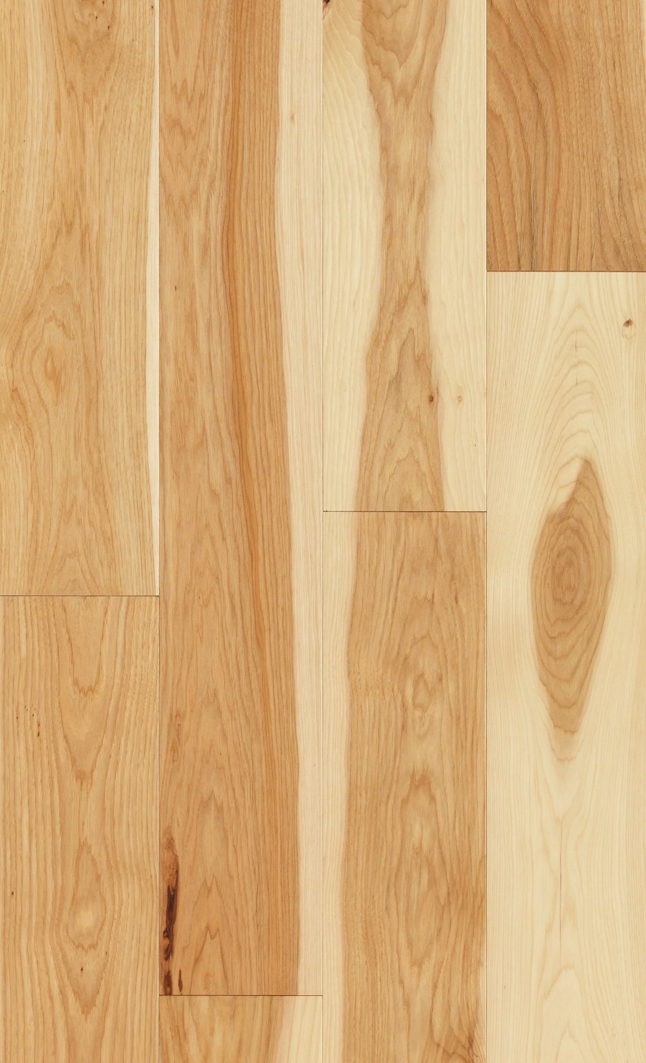 Photo of a wooden floor with light and dark wood planks arranged in a pattern.
