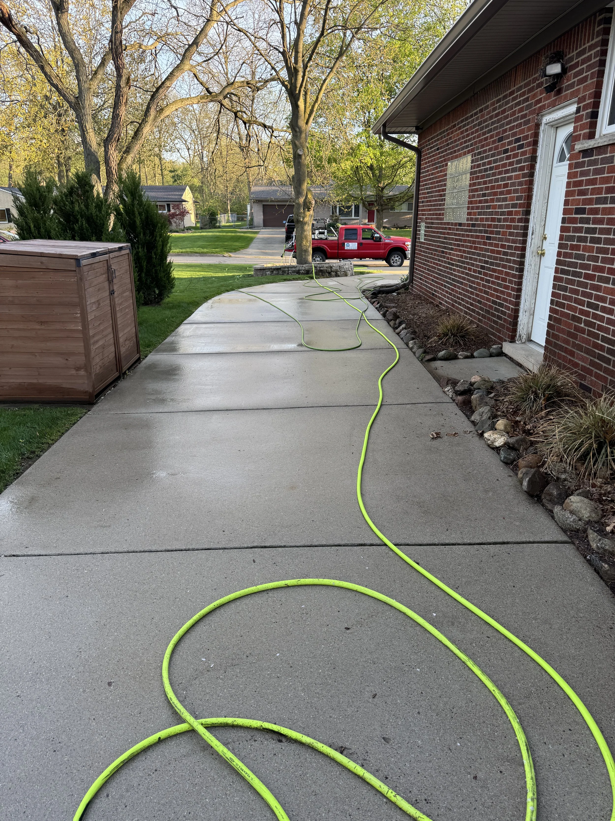 Concrete driveway after cleaning in Wayne County, MI | Island Shine