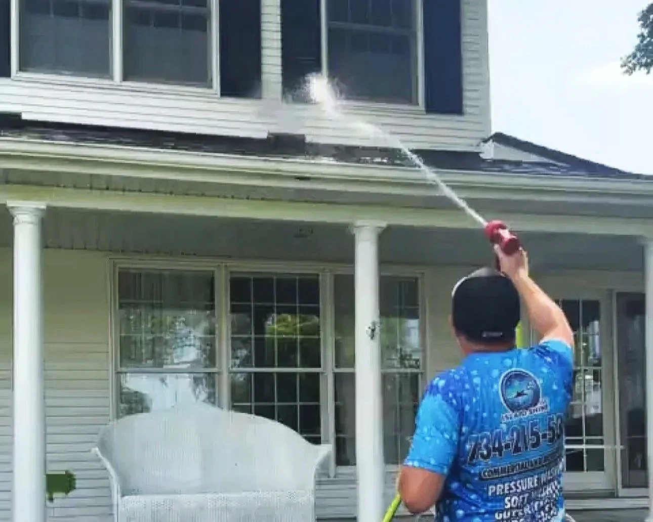 House soft wash cleaning siding in Wayne County, MI | Island Shine
