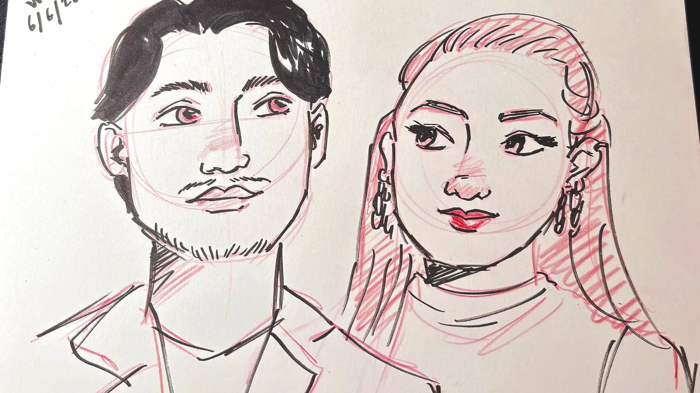 A live portrait illustration at a wedding of a man and woman in red colored pencil and felt pen.