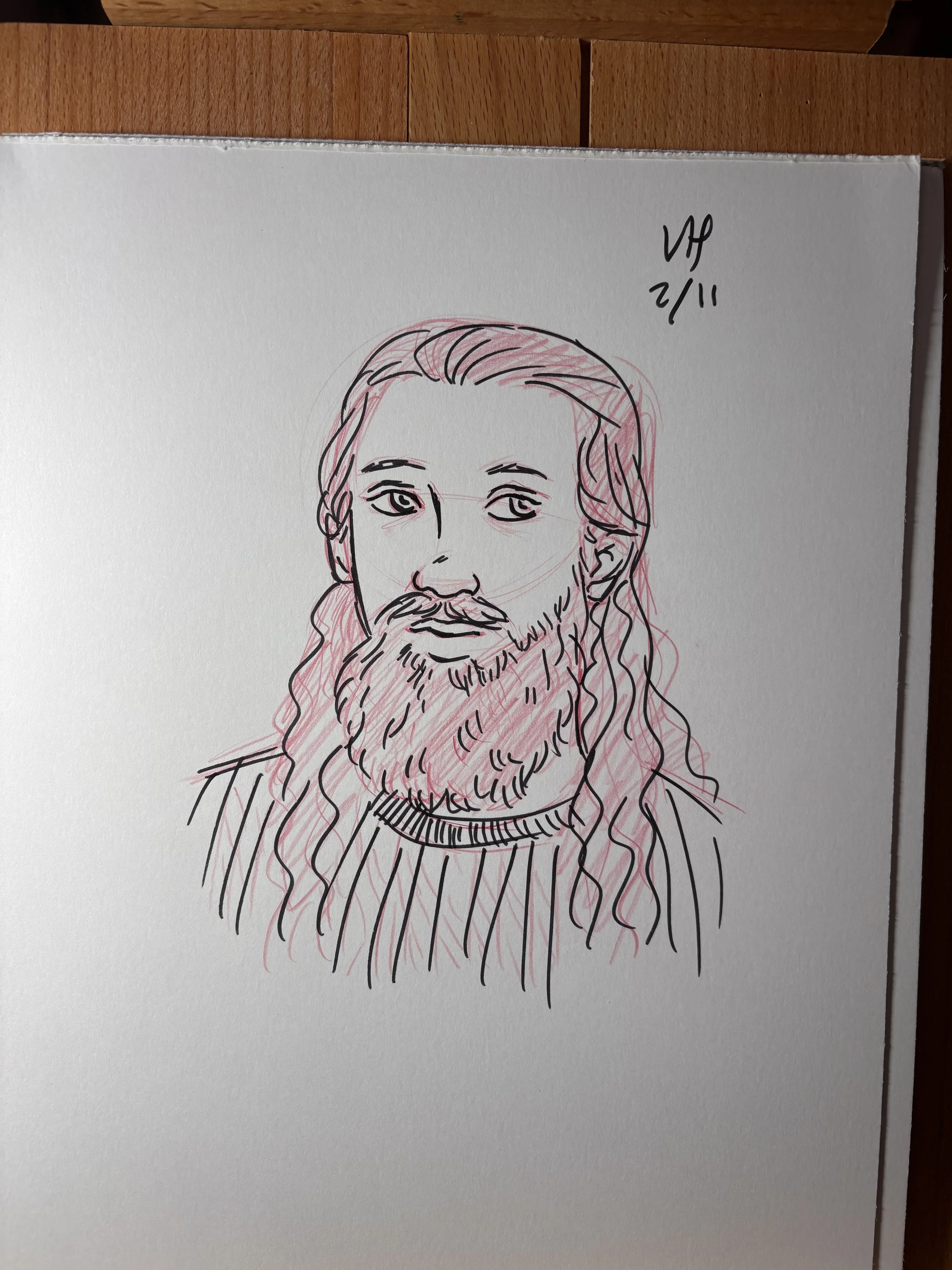 Hand-drawn portrait of a man with long hair and a full beard on white paper. Live portrait sketch. Ink and colored pencil.