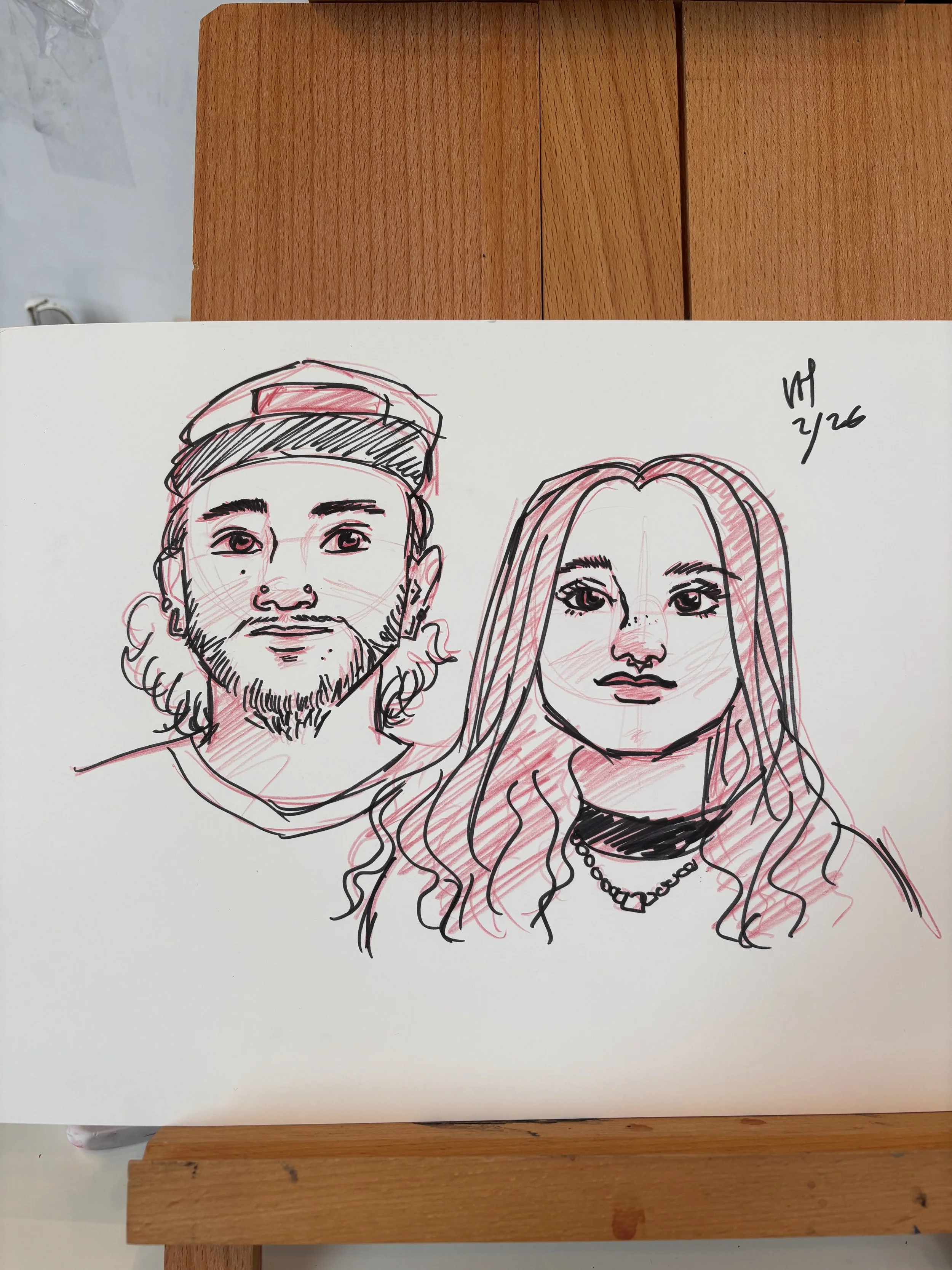 Drawing at a small business event, live portrait artist, pencil and ink art. Quick caricature sketch.