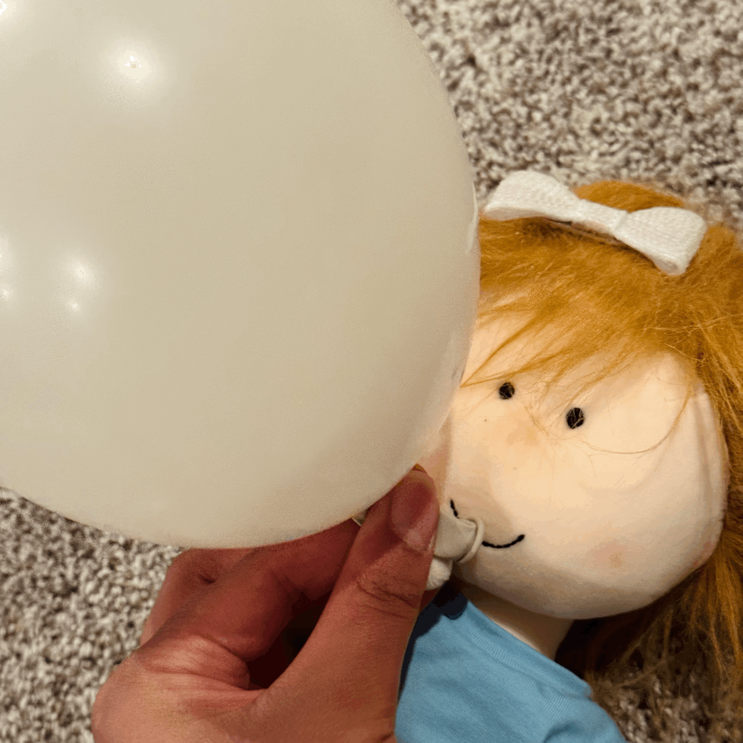blowing balloons