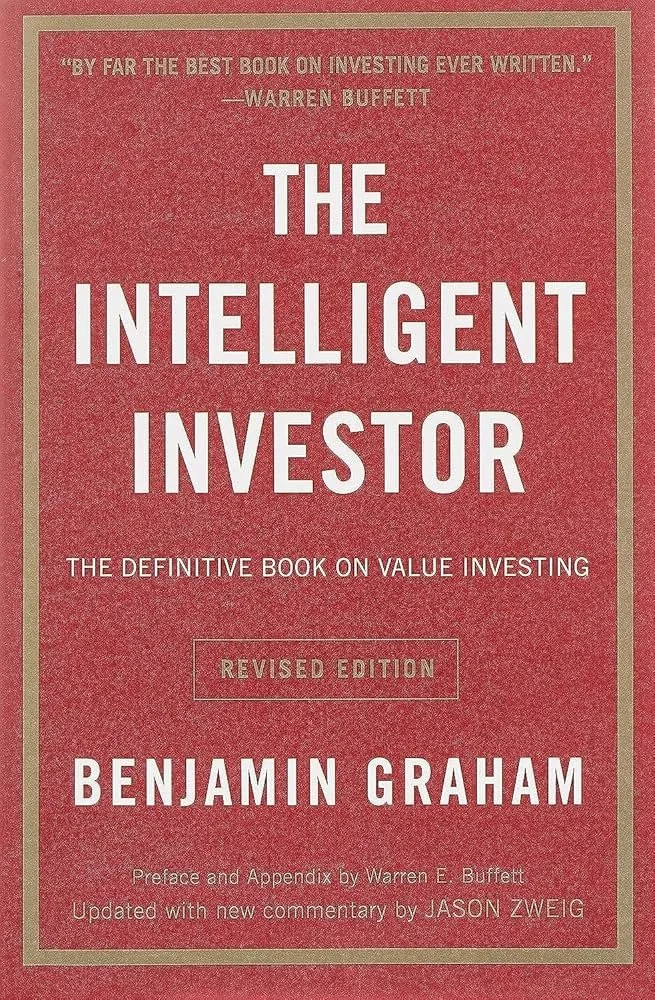 Cover of a book titled 'The Intelligent Investor' by Benjamin Graham, with a quote at the top from Warren Buffett praising the book on investing.