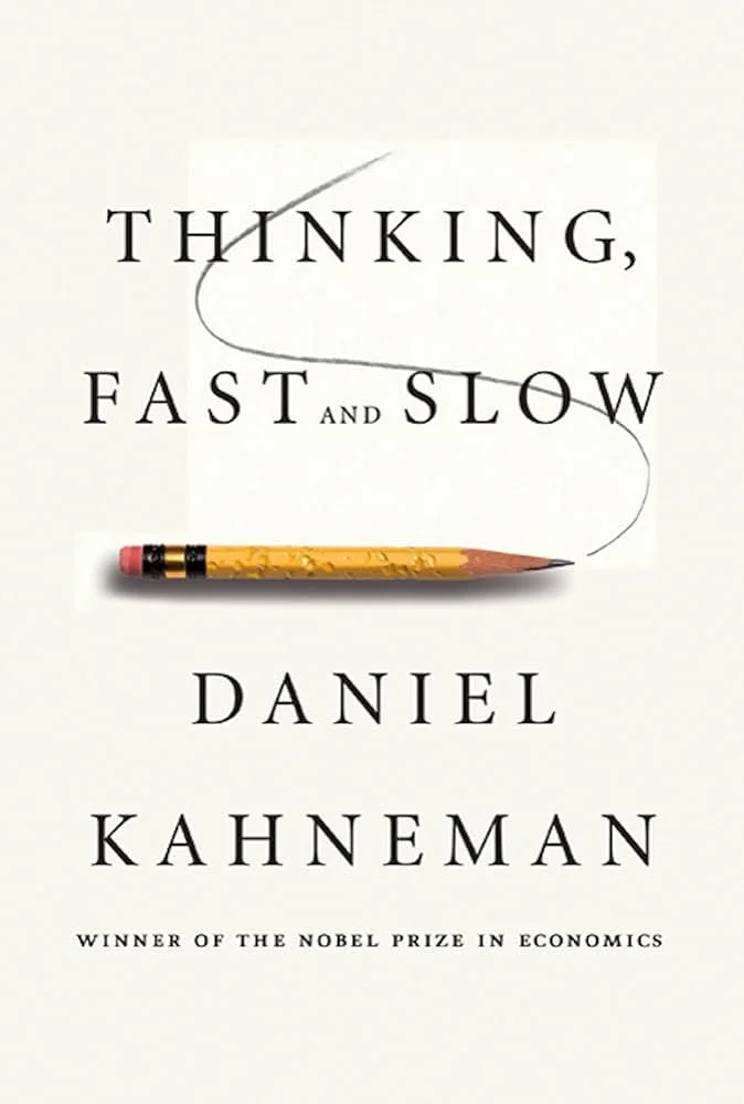 Book cover of "Thinking, Fast and Slow" by Daniel Kahneman, featuring a pencil with an eraser on the left and a swirl line connecting the words.