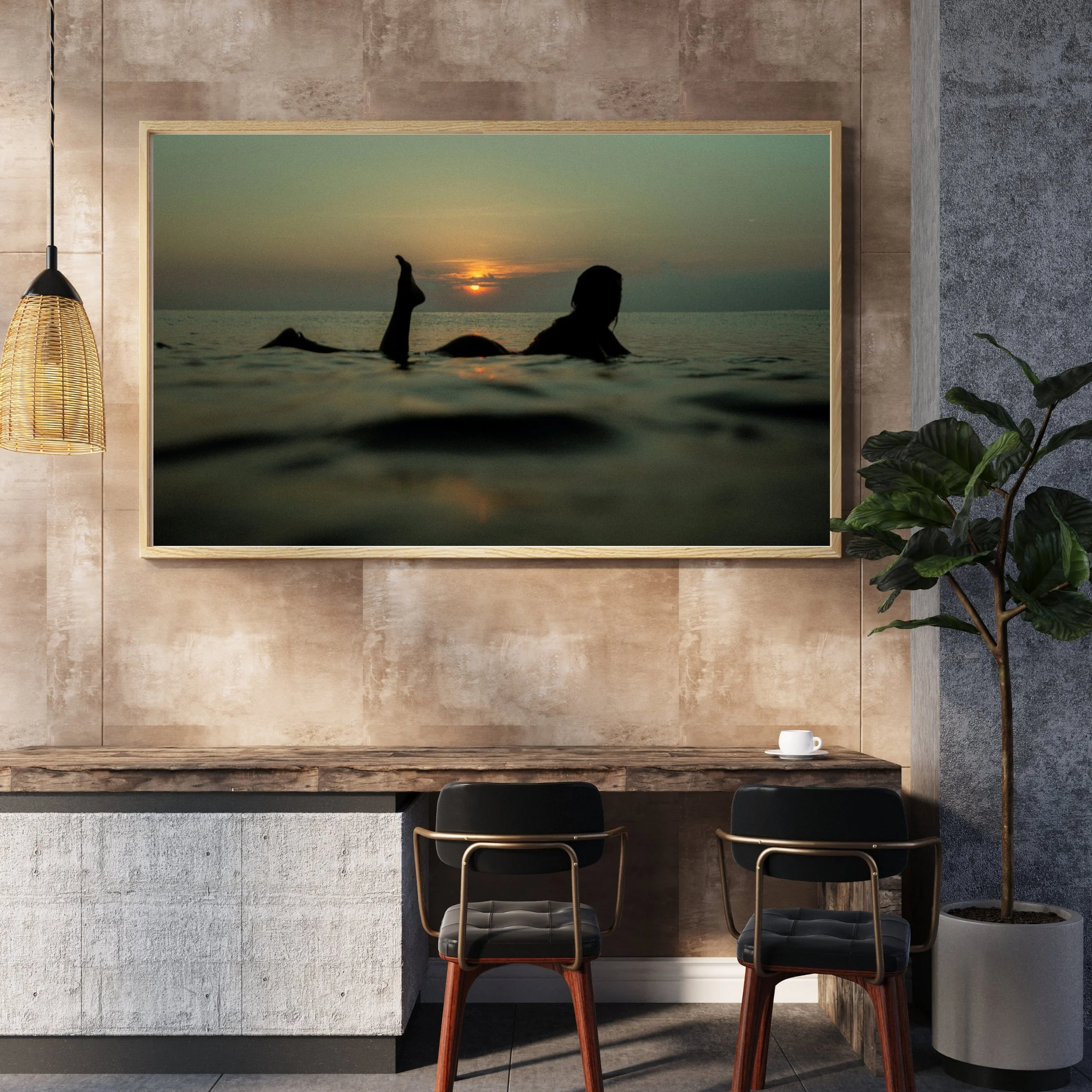 Surf photography female sunset surfer wall art print displayed in modern living room interior