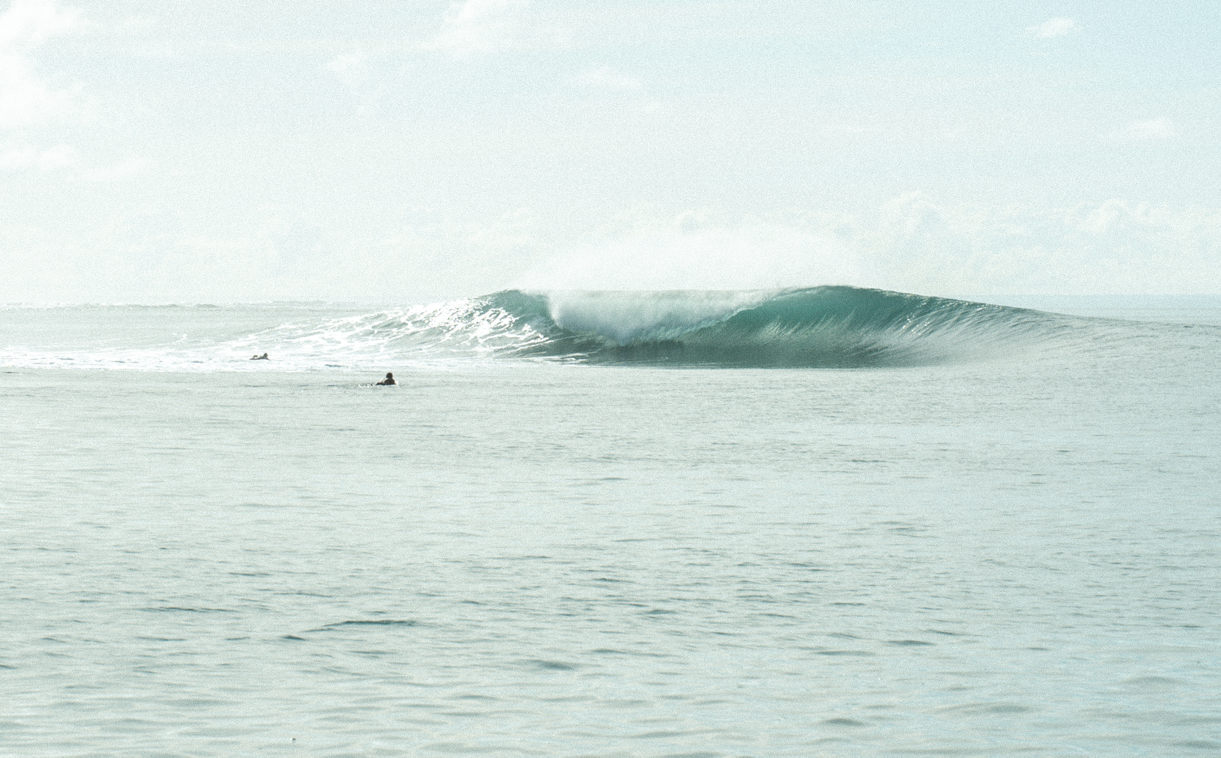 Minimal ocean photography print details of A-frame wave in the Mentawai Islands, Indonesia