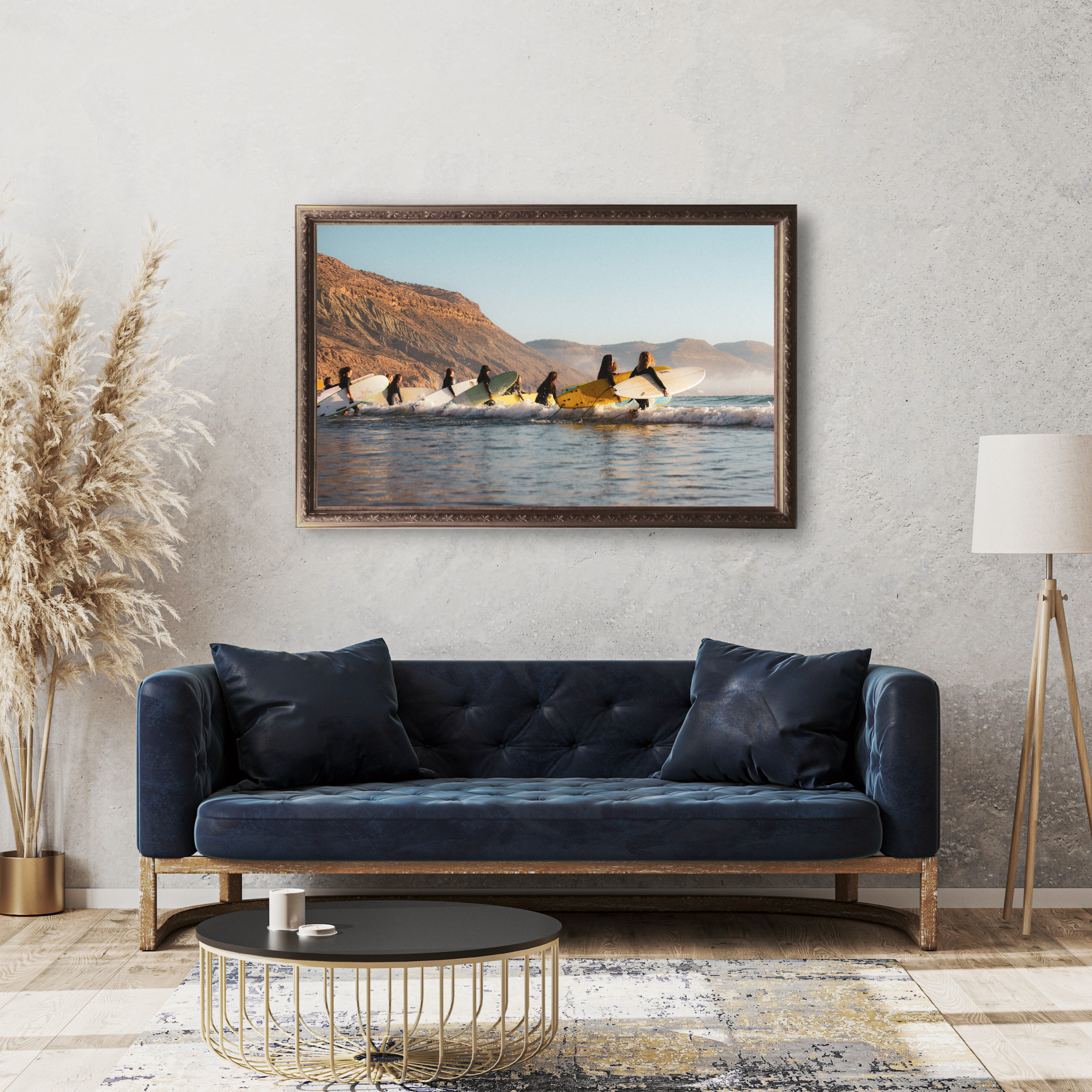 Surf lifestyle photography print of female surfers entering the ocean at sunrise with coastal mountains of Imsouane Morocco living room decor