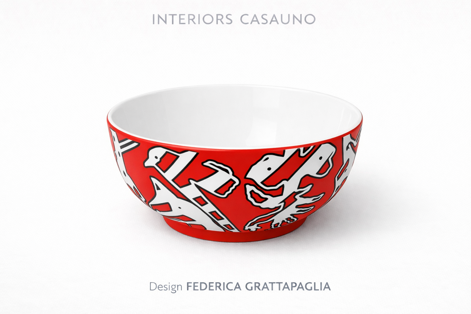 Red bowl with black and white abstract pattern, designed by Federica Grattapaglia, labeled as 'Interiors Casauno'.
