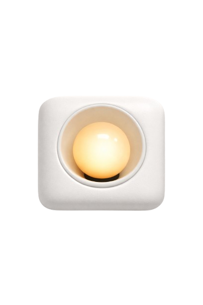 A white square-shaped device with a circular indentation holding a glowing yellow spherical object, likely a light or lamp, against a white background.