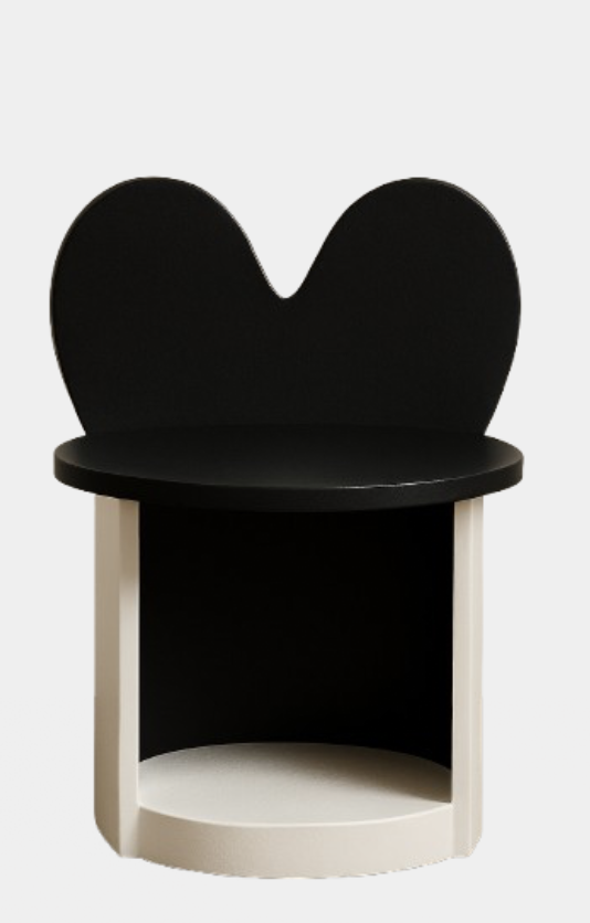 Contemporary black and white accent chair with a rounded back and circular base.