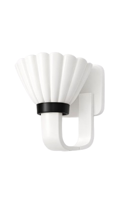 A white ceramic lamp with a scalloped lampshade attached to a white wall mount