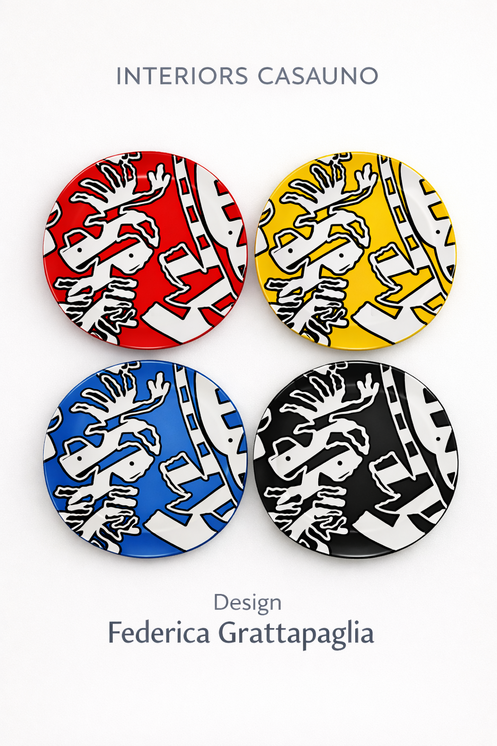 Four decorative plates featuring a stylized unicorn design in red, yellow, blue, and black colors, arranged in a grid with a white background. Text above reads 'Interiors CasaNo' and below 'Design Federica Grattapaglia'.