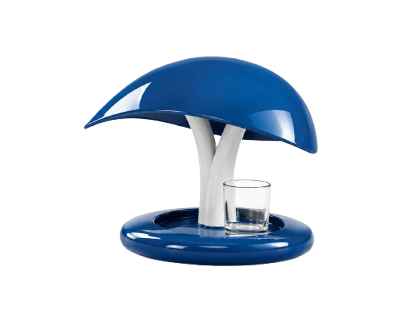 A blue shark-shaped adult electric toothbrush with a glass of water in its mouth