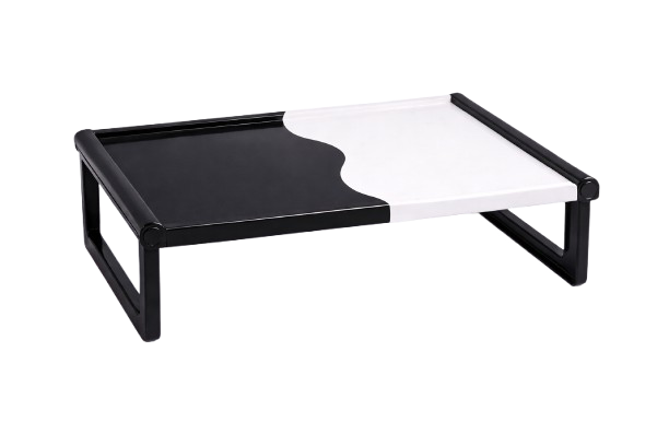 A black and white Y-shaped design on a rectangular table or platform.