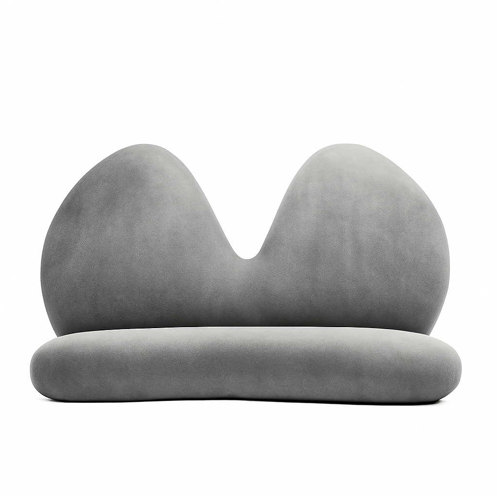 A modern, gray, sculptural chair with a rounded base and a backrest resembling two large, rounded peaks, set against a plain white background.