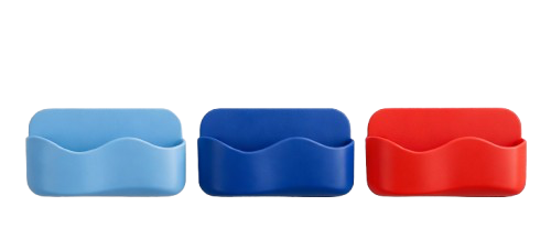 Three plastic desk organizer trays in light blue, dark blue, and red, lined up side by side.