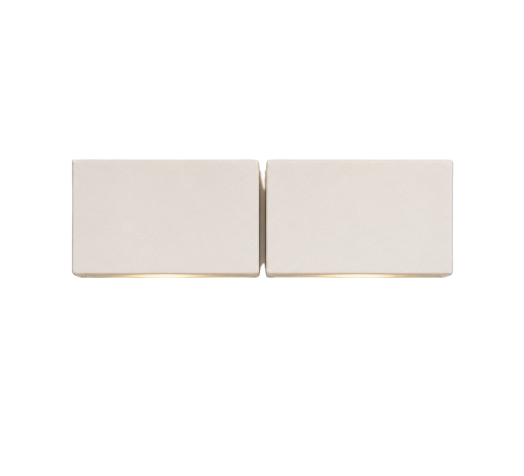 Open white book or box lying flat on a surface, with two pages or sides slightly separated.