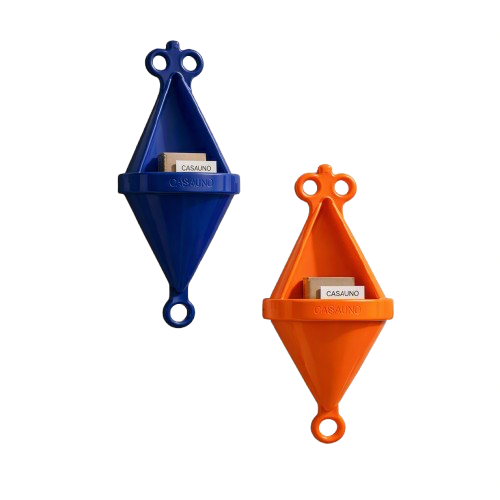 Two wall-mounted soap dispensers, one blue and one orange, with one carrying a label that reads "CASAUNO."