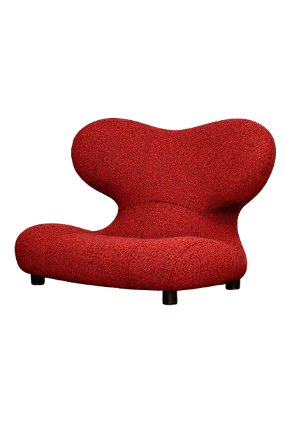A modern red upholstered chair with a unique, curved backrest designed for comfort and style.