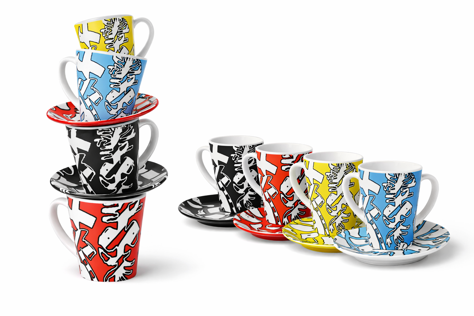 Set of colorful ceramic cups and saucers with abstract black, white, red, yellow, and blue graffiti-like patterns, arranged in two stacks and additional cups on saucers.