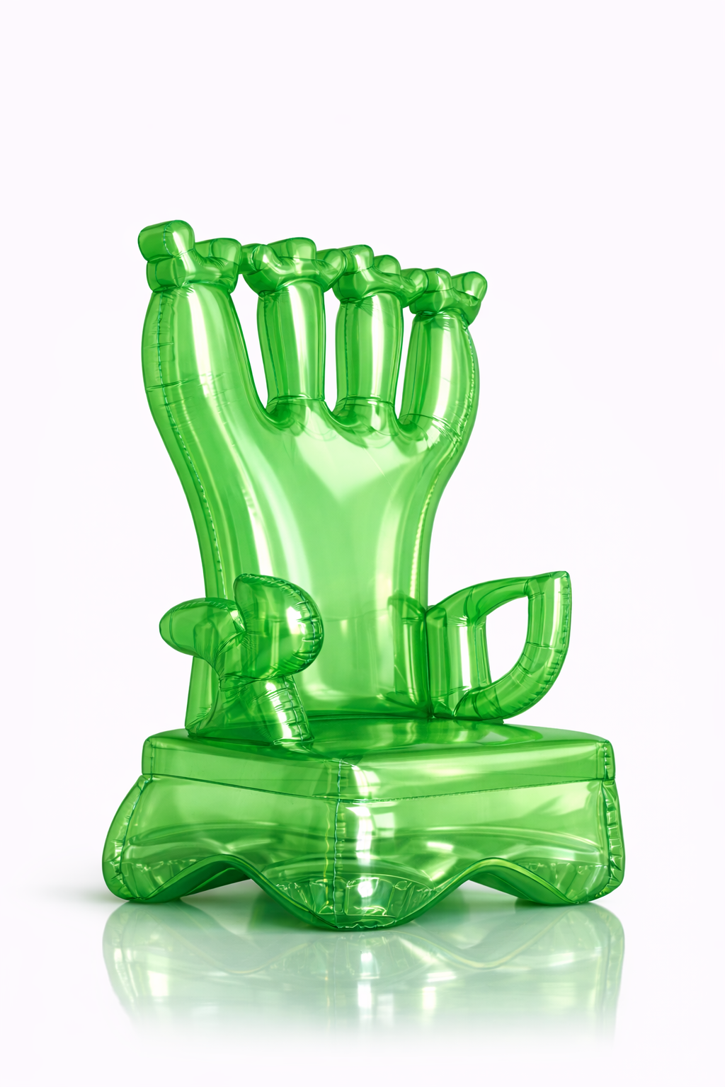 Green inflatable balloon sculpture of a fist with a raised index finger, on a small raised platform.